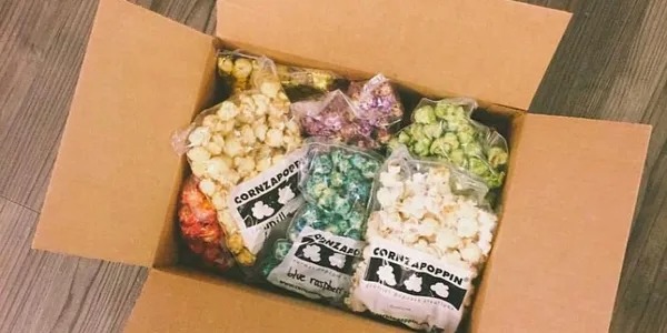 A box of popcorn is shown with different colors.