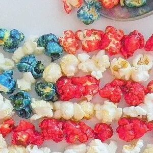 Popcorn shaped like the american flag on a table.
