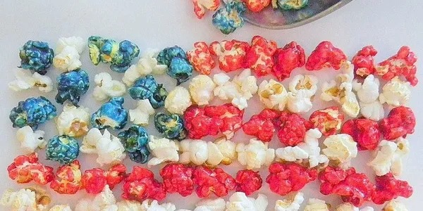 Popcorn shaped like the american flag on a table.