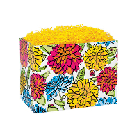 A colorful floral basket with yellow shredded paper.