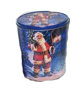A tin of santa clause with bells and a tree.