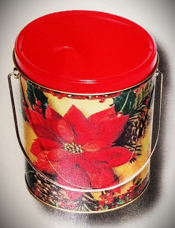 A red plastic container with a picture of poinsettia.